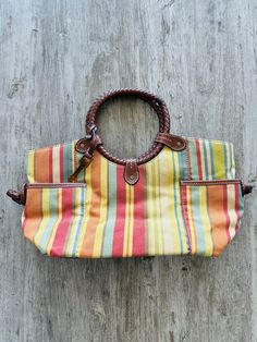 Fossil Handbag Tote Hobo Canvas Leather Trim Colorful Stripes Pockets Good vintage condition There are some black marks inside of the bag Overall the bag looks great Authentic See all photos for measurements Casual Multicolor Hobo Bag With Braided Handles, Casual Multicolor Handheld Satchel, Retro Multicolor Shoulder Bag With Leather Handles, Multicolor Canvas Hobo Bag With Adjustable Strap, Multicolor Hobo Bag With Braided Handles For Travel, Multicolor Rectangular Canvas Hobo Bag, Casual Multicolor Canvas Satchel, Multicolor Canvas Crossbody Bag, Daily Use Multicolor Hobo Bag With Braided Handles