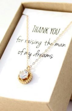 a thank card with a necklace in it