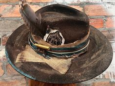 **Variations in materials used due to each hat being custom hand made. Design of hat will remain as close to original as possible** Painted, burnt and distressed! 100% wool One Size Fits MOST. If you do not see a style you like, shoot us a message and we will try to create your vision!! Handmade Rustic Fedora For Western-themed Events, Rustic Handmade Fedora For Western-themed Events, Rustic Fitted Handmade Hat Bands, Handmade Rustic Fitted Hat Bands, Handmade Artisan Fedora For Winter, Handmade Fitted Rustic Hat, Rustic Brown Handmade Fedora, Handmade Rustic Brown Fedora, Handmade Rustic Fitted Hats