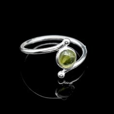 Handmade 925 Sterling Silver Peridot Ring, August Birthstone Ring,  Round Gemstone Jewelry, Unique Gift for Her, Peridot Jewelry 💖Gemstone Name : Natural Peridot Purity: 925 Parts Per 1000 Metal :  925 Sterling Silver  Ring Size :  All Size Available Weight : 3.80 gm 💎 Material: 925 Sterling Silver 💚 Gemstone: Natural Peridot (August Birthstone) 🔨 Handcrafted: Unique and artisan-made with attention to detail 🎁 Gift-Ready: Ideal for birthdays, anniversaries, or special occasions 🌍 Versatile Style: Suitable for both casual and formal wear Make this stunning Peridot ring a cherished addition to your jewelry collection. ✨We accept custom and personalized order. It can be change in the gemstone, ring design and ring size. Please send us message if you are interested in a custom creation. Green Sterling Silver Stackable Crystal Ring, Green Stackable Sterling Silver Crystal Ring, Adjustable Peridot Ring, Adjustable Round Peridot Ring, Green Sterling Silver Stackable Open Rings, Adjustable Green Moonstone Ring In Sterling Silver, Green Moonstone Sterling Silver Ring, Adjustable Green Moonstone Sterling Silver Ring, August Birthstone Ring