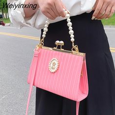 Shipping: Worldwide Express Shipping AvailableDelivery time: 🚚7-15Days Fast ShippingReturns: Fast refund,💯100% Money Back Guarantee.Handbags Type: Messenger BagsMain Material: PULining Material: PolyesterShape: FramePlace Of Origin: HE BEI ProvincePlace Of Origin: HE BEI ProvinceOrigin: Mainland ChinaCN: HebeiHardness: HARDPattern Type: SolidInterior: Cell Phone PocketDecoration: PEARLDecoration: SequinedExterior: Solid BagOccasion: PartyClosure Type: HaspGender: WOMENStyle: FashionModel Numbe Bag With Pearls, Pearl Clutch Bag, Custom Bridesmaid Dress, Small Lady, Pearl Bag, Women Crossbody Bag, Elegant Bags, Pearl Leather, Genuine Leather Bags