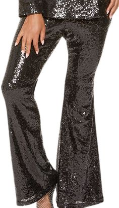 Introducing the Love the Queen 17499-Church Pants that encapsulate sophistication with a touch of sparkle for the modern woman. The pants feature a striking flare design that adds a classic yet contemporary silhouette to any ensemble. Adorned with shimmering sequins throughout, these pants are guaranteed to turn heads and make a statement wherever you go. The comfort-fit waistband ensures these pants sit comfortably at the midsection, offering both comfort and style without compromising on either. Designed to flatter various body types, they provide ample movement for an effortlessly chic look. The high-quality fabric blend allows for a soft touch, while the durability ensures they can be a go-to piece in your wardrobe for years to come. Whether attending a church service, participating in Church Suits, Church Service, The Queen, Modern Woman, Fashion Games, Body Types, Black Pants, Timeless Design, The Modern