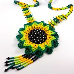 Beautiful Mexican Handcrafted Necklace New Without Tags Condition Follow For Fashion Treasures San Francisco ‘Modern Boho Style’ Make An Offer Seed Bead We Look Forward To Helping You Find Your Next Beautiful Treasure Dont Miss Out On This Beauty Length 16” Yellow Flower-shaped Beaded Necklaces, Yellow Flower-shaped Beaded Necklace, Yellow Flower Necklace For Summer, Summer Yellow Flower Necklaces, Summer Yellow Flower Necklace, Yellow Flower Necklace With Colorful Beads As Gift, Yellow Flower-shaped Beaded Necklaces With Colorful Beads, Yellow Beaded Flower Necklace As Gift, Yellow Beaded Flower Necklace Gift