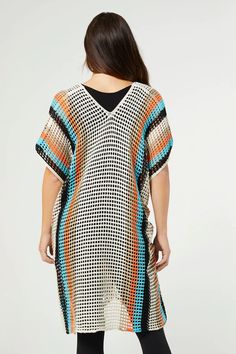 Embrace the island vibes with our Jubilee Striped Crochet Poncho! This tunic-length, oversized fit poncho offers great coverage and a breezy feel. With adjustable lace-up sides, you're in control of your style. Perfect for a relaxed and fashionable beach day! ONE SIZE Casual V-neck Beach Poncho, Casual Relaxed Fit Beach Cover-up, Oversized Beachwear Cover-up For Vacation, Oversized Casual Poncho For Vacation, Casual Poncho For Vacation, Vacation Relaxed Fit Cover-up, Multicolor Poncho For Beach Cover-up In Summer, Casual Tunic Cover-up For Vacation, Casual Tunic Cover-up For Beach Season