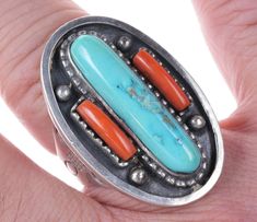 "Louis Aberbach 1970's Sterling turquoise and coral ring. Very good looking and well made size 9 ring. Louis was active in the 70's and possibly a little later and did some nice work obviously from this ring but I don't know much or anything else about him, may have been anglo. 1 5/8\" face, 21.3 grams. All precious metals are tested and guaranteed, any Native American jewelry referred to as Silver or Sterling is guaranteed to be a minimum of 90% (coin) silver and possibly higher content. Anythi Adjustable Vintage Nickel-free Turquoise Ring, Vintage Multi-stone Turquoise Ring Gift, One-of-a-kind Silver Turquoise Ring In Sterling Silver, Blue Multi-stone Turquoise Ring In Sterling Silver, Blue Vans, Coral Ring, Adjustable Southwestern Turquoise Ring Nickel-free, Stone Inlay, Crown Jewels