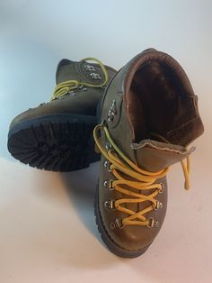 In amazing like new condition, these vintage Italian hiking boots are well built and made to last a lifetime. Italian made by Gaerne circa 1970's with Vibram Montagna souls and new original high durability laces, these Edge classics are sure to endure not to mention impress! High-top Lace-up Hiking Boots With Leather Sole, Lace-up Work Boots With Leather Sole For Adventure, Hiking Lace-up Boots With Vibram Sole And Round Toe, Rugged Lace-up Boots With Vibram Sole For Adventure, Vintage Lace-up Boots With Goodyear Welt Construction, Steel Toe Lace-up Boots For Adventure, Vintage Lace-up Boots With Rubber Sole And Moc Toe, Vintage Lace-up Boots For Outdoor Activities, Vintage Leather Boots For Outdoor Activities