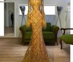 Shop Wedding, Special Occasion Dresses and Flower Girl Dresses | Luulla Gold Mermaid Dress With Sweep Train For Prom, Gold Long Sleeve Evening Dress For Gala, Gold Long Sleeve Gala Gown, Gold Long Sleeve Gown For Gala, Gold Long Sleeve Gown For Prom Season, Gold Long Sleeve Evening Dress For Prom, Glamorous Gold Mermaid Dress For Banquet, Gold Mermaid Dress With Sweep Train, Gold Glamorous Mermaid Dress For Banquet