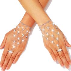 PRICES MAY VARY. Silver crystal gloves feature a unique ring and sparkling crystal, making your attire more charming and fashionable. Glitter gloves are suitable for most women. Their fabric fits very well, and the lace shows the curves of your hands, making you more attractive. Fashion hand chains with fashion style and rhinestones design, look very elegant and refined, make you more attractive in the eyes of others. Fingerless jewelry gloves can be used for masquerade parties, Halloween partie Crystal Gloves, Metal Gloves, Glitter Gloves, Rhinestone Gloves, Chain Crafts, Night Costume, Metal Glove, Crystal Making, Hand Chain Jewelry