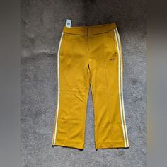 These Track Pants Are From Yara Shahidi's 2021 Collaborative With Adidas. They Are New With Tags And Have Never Been Worn. Adidas Stretch Wide Leg Bottoms, Yellow Straight Pants With Pockets, Yellow Wide-leg Workwear Bottoms, Yellow Wide-leg Workwear Pants, Yellow Wide-leg Pants For Work, Yellow Ankle-length Pants With Pockets, Ankle-length Yellow Pants With Pockets, Stretch Yellow Pants With Pockets, Yellow Stretch Pants With Pockets