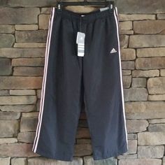 Adidas Capri Pants With Pink Stripes And 2 Front Pockets. Elastic Waistband And Drawstring. Brand New With Tags. Capri Sweatpants, Adidas Pants, Adidas Black, Pink Stripes, Black Adidas, Adidas Women, Pant Jumpsuit, Capri Pants, Capri