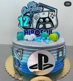 a birthday cake with a video game controller on top