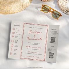 an open wedding program with sunglasses and straw hat next to it on a white table cloth