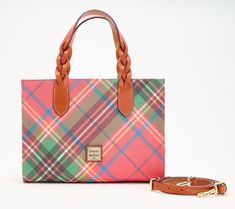 Timeless in design, the Gia satchel boasts a rich plaid print with a braided detail on the handles and luxe goldtone hardware. Super lightweight and easy to carry, this coated cotton bag is a prime pick for the season. From Dooney & Bourke. Fall Shopping Bag In Coated Canvas, Fall Shopping Bags In Coated Canvas, Plaid Print, Cotton Bag, In Design, Dooney Bourke, Fashion Handbags, Satchel, Gold Tones