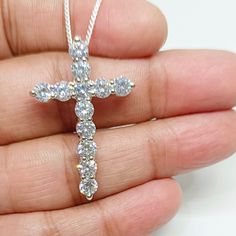 2.50 Ct Round Cut Simulated/Moissanite Diamond Cross Pendant Necklace 18" Chain 14k White Gold Finish Brand:Tishya Jewellers  Style:Pendant Main Stone:Simulated Diamond / Moissanite Theme:Cross Pendant Metal:Sterling Silver Length:18 - 19.99" Metal Purity:925 parts per 1000 Modified Item:No Stone Creation:Simulated / Moissanite Gender:Unisex Certification:N/A Cut:Excellent Country of Origin:India Total Carat Weight (TCW):2.50 ct Country/Region of Manufacture:India Length (inches):18" Main Stone Creation: Simulated/Moissanite Fancy Diamond Colour:White Main Stone Shape:Round Metal Finish:14k White Gold Finish Secondary Stone:Simulated Diamond/Moissanite Buyer Note:Chain Not Send As Per Picture ANY SIZE, COLOR, CLARITY, SHAPE REQUIREMENT FOR OUR DIAMONDS AND OTHER PRODUCTS ARE MOST WELCOME T Diamond White Cross Pendant Necklace In Cubic Zirconia, White Diamond Cut Pendant Cross Necklace, White Cross Pendant With Single Cut Diamonds, White Diamond-cut Pendant Cross Necklace, Diamond-cut Crucifix Cross Necklace, Diamond Cross, Diamond Cross Pendants, Fancy Diamonds, Jesus On The Cross