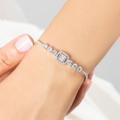 Beautifully crafted Silver Baguette CZ Diamond Cut Bracelet is the unique one of our tennis bracelet collection. Baguette Tennis Bracelet is made from high quality 925 solid sterling silver and multishaped and cutted white cubic zirconia stones. Elegant piece of our collection is available for daily using and for the classy events. This piece definitely will be the perfect match to your outfit and great gift idea for every special day. Baguette Cut Tennis Bracelet will add elegance to you and your loved ones.  This adorable Sterling Silver Baguette CZ Diamond Cut Tennis Bracelet jewelry is what you're looking for. * Material: High Quality Solid 925 Sterling Silver * Finish: Sterling Silver  * Chain: Adjustable 3 cm Extension * Gemstone: High Quality White Cubic Zirconia Stones PACKAGING IN Baguette Bracelet, Bracelet Tennis, Jewelry Elegant, Diamond Jewelry Necklace, Diamond Chain, Elegant Bracelet, Bracelet Argent, Baguette Cut, Bracelet Collection