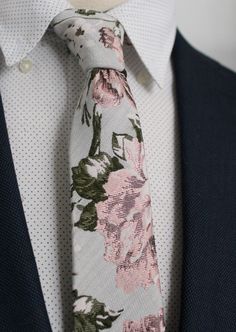 "The Perfect Wedding Tie <3 Each Handsome&Lace necktie is handmade with the idea of artfulness and tailoring in mind. This is not a sweatshop tie, I take personal satisfaction from creating these pieces one by one, with no shortcuts.   I hand crafted and stitched this dreamy wedding necktie from a very soft jacquard floral fabric in a very pale grey with blush and green florals in a larger print. This fabric was even pricier than silk!! (and rightfully so) .  I can't say enough about how much I Elegant Cotton Suit And Tie Accessories For Wedding, Elegant Cotton Ties For Gifts, Fitted Silk Tie For Wedding, Silk Fitted Suit And Tie Accessories For Wedding, Elegant Patterned Tie With Floral Print, Elegant White Ties For Spring, Elegant Spring Ties For Groom, Elegant Cotton Neckwear, Elegant White Spring Ties