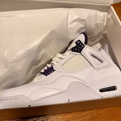 A Metallic Purple Jumpman Logo On The Heel, White Sole, And Metallic Purple Air Bubble Complete The Design Extended Grade School Size 7.5 Air Jordan 4 White Leather With Rubber Sole, White Leather Air Jordan 4 With Rubber Sole, White High-top Air Jordan 4 With Perforations, White Air Jordan 4 With Perforations, White Low-top Air Jordan 4 With Perforations, White Leather Air Jordan 4 With Perforations, White Synthetic Air Jordan 4 With Boost Midsole, White Synthetic Air Jordan 4 Lace-up, Air Jordan 4 With White Rubber Sole