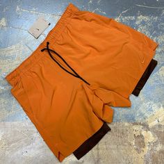 I’m Selling A Brand New With Tags Pair Of Nike Unlimited 7” Versatile Dri-Fit Men’s 2 In 1 Compression Lined Running Shorts In Orange With Brown Compression Shorts And An Embroidered Nike Check! Features Drawstring, Compression Shorts Lining And Side Pockets. Adult Xl Width Measures 18 Inches Hip To Hip Length Measures 17.5 Inches Hip To Leg Opening Inseam Measures 7 Inches Nike Id Dv9334-815 Msrp $70 Click Add To Bundlebelow To Receive An Offer! Combine Items And Save On Shipping! Orange Athleisure Activewear With Built-in Shorts, Functional Orange Activewear For Training, Orange Functional Running Activewear, Orange Activewear With Built-in Shorts For Training, Orange Activewear Shorts For Sports, Orange Athleisure Athletic Shorts With Built-in Shorts, Orange Athleisure Activewear For Running, Orange Sportswear For Running, Orange Workout Bottoms With Built-in Shorts