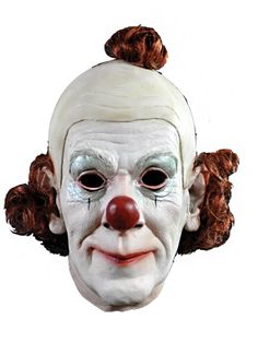 a creepy clown mask with hair on top