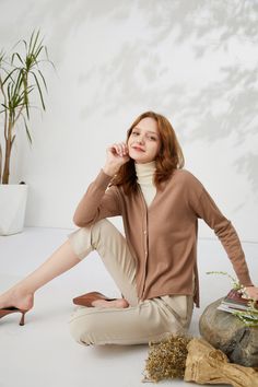 Fabric: 33.2% Wool 36.2% Acrylic 30.6% Polyester Color: Khaki Care: Hand wash or dry clean This cardigan is soft and comfortable. The V neckline is flattering on any body type, while the ribbed cuffs add an adorable detail to the sleeves. Side vents and dropped shoulders. Front buttons closure. Model is 175cm/5'9" tall and wearing a size M. Brown Cardigan For Layering, Body Types, Knit Cardigan, Knit Top, Normcore, Knitting, Fabric, How To Wear, Color