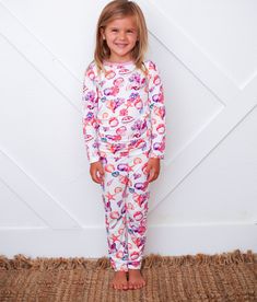 Get ready for the little's sweet, summertime slumber with our Beachy Keen Pajamas! Made from super soft bamboo, these cozy jammies are printed with bright and colorful seashells. Fun, comfy and colorful! 93% Bamboo; 7% Spandex Wash cold with like colors; stays soft wash after wash Fits snug; not treated with flame retardants Colorful Seashells, Toddler Pajamas, Bodysuit Dress, Sweet Summertime, Pajama Dress, Long Romper, Short Rompers, Mommy And Me, Baby Toddler