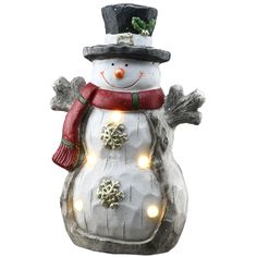 a lighted snowman with a hat, scarf and mittens on it's head