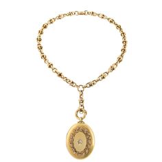 An English antique 18 karat gold pendant locket with diamonds. The pendant locket has 1 old mine-cut diamond with an approximate total weight of .18 carat, which is surrounded by a seed pearl-set garland. The locket is suspended from an antique 18 karat chain and has a split opening with two interior compartments. Circa 1890. Dimensions: Chain 25" length; locket 1-1/2" width (MG #15649) Necklaces Inspiration, Dreamy Jewelry, Victorian Pendant Necklace, Princess Diamond Engagement Rings, Antique Necklaces Design, Gold Locket Necklace, Antique Necklaces, Pendant Locket, Antique Locket