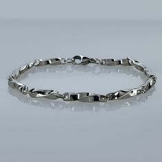 Brand New Men's White Gold Chain Link Bracelet Genuine 14k White Gold Plated Sterling Silver Length - 8" (Most Common Men's Size) Available In 7" As Well. Retail Price $295 Buy With Confidence From A Trusted Seller With A 99%+ Feedback Rating! A0239 (Id-1084-) Formal Sterling Silver Link Bracelet With Polished Finish, Classic Link Bracelets With Diamond Cut, Formal Polished White Gold Chain Bracelet, Formal Sterling Silver Curb Chain Bracelet, Formal Gold Stainless Steel Bracelet With Solid Links, Formal Stainless Steel Bracelet With Polished Finish, Classic Chain Bracelet With Rectangular Links For Anniversary, Formal Oval Link Bracelet With Diamond Cut, Formal Oval Link Diamond Cut Bracelets