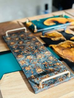 the table is covered with different types of wood and metal items that are sitting on top of each other