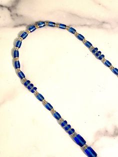 Incredible, but yes its really 34inches long. Very good condition, some are slightly scratched, consistent with age and appropriate for normal wear. Some of these beautiful crystal beads even have bubbles and inclusions. This necklace is so pretty on, layer it with your other blue and crystal necklaces for a fabulous look. This item will be shipped priority mail insured for full value. please contact me for international shipment. All product photos are of the actual item. Product photos are con Art Deco Dress, Crystal Necklaces, Dress Clip, Vintage Bakelite, Faceted Glass, Glass Necklace, Product Photos, Priority Mail, Crystal Necklace