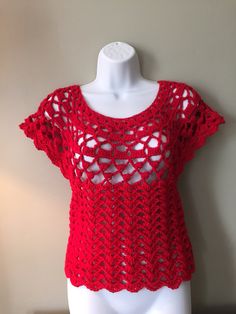 Handcrafted from acrylic yarn. Beautiful vibrant red color will enhance your life energy. Light and breezy it will be nice addition to your summer wardrobe. Measurements: Length - 20" ( 51 cm) Width at the shoulders - 23" ( 59 cm)             under the bust - 15" ( 38 cm) Fits size S Red Sleeveless Crochet Top, Red Fitted Crochet Lace Top, Casual Red Crochet Knit Top, Red Crochet Bohemian Top, Red Crochet Beach Top, Red Crochet Sleeveless Top, Red Crochet Top For Beach, Red Crochet Top For Vacation, Red Crochet Lace Top For Vacation