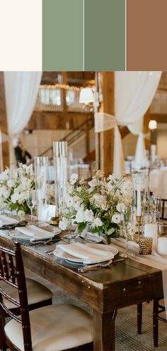 the table is set with white flowers and greenery for an elegant wedding reception or special event