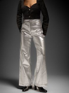 Regular-fit metallic pants. with 2 front pockets for using them all day long. Go to the office or the dance floor, get them, or regret itHandmade in BarcelonaWe produce every item one by one on demandPrices so low for exclusive designs handmade in Europe need some patienceGetting you the best deals for luxury quality products with minimal environmental impact requires a little more waitingAs no material or energy is misused to make this on-demand piece, we can offer a better price. What is good Silver Shiny Disco Bottoms, Shiny Silver Disco Bottoms, Disco Silver Shiny Bottoms, Wide Leg Leather Pants With Pockets For Party, Fitted Metallic Shiny Bottoms, Fitted Shiny Metallic Bottoms, Shiny Straight Leg Party Pants, Shiny Straight Leg Pants For Party, Glamorous Metallic Bottoms With Shine