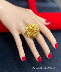 Gold Flower Ring for Women, 24k Dubai Gold Plated Ring, Indian Bridle Ring, Wedding Ring, African Jewelry, Nigerian Jewelry, Arab Fashion Make a bold statement with this stunning gold jewelry ring. Perfect addition to any outfit. This ring sure to turn heads. its unique design and intricate details make it a true statement piece.  don't wait any longer to add this stunning piece to your collection.  You will love this Gold ring because is something that matches many outfits and styles.  Suitable Elegant Gold Flower Ring For Wedding, Traditional Gold Flower Ring For Formal Occasions, 22k Gold Flower Ring As Gift, 22k Gold Flower Ring For Gift, Gold Flower-shaped Wedding Rings, Gold Filigree Ring For Wedding, 22k Gold Filigree Wedding Ring, 22k Gold Filigree Ring For Wedding, Elegant Gold Flower Ring For Marriage