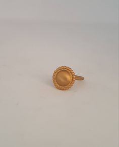 Gold disc hammered ring. Delicate disc ring. Dainty designer ring. casual ring. round ring with granulates. Everyday ring. Holiday gift. A beutifull gold delicate ring. Handmade by hammering a domed disk, with small granulates around it. A perfect ring for every day. You can also have it in sterling silver or black oxid silver. -gold plated brass -14 karat gold plating -free shipping worldwide -gift box If you would like to see other rings I have made, please follow this link: https://www.etsy.c Hammered Dome Ring Gift, Hammered Dome Ring As Gift, Gift Dome Ring With Hammered Detail, Handmade Gold-plated Midi Rings, Gold Pearl Ring With Metal Band, Handmade Yellow Gold Dome Ring With Round Shape, 14k Gold Hammered Engraved Ring, Gold Hammered Engraved Ring, Hammered Gold Round Ring