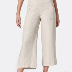 An Effortless High-Waist Pant In The Ideal Off-White, These Are Cut Straight Through The Hip, Then Cropped And Flared At The Ankle. Summer Mid-rise Pants With Side Pockets, Mid-rise Summer Pants With Side Pockets, Casual Bottoms With Natural Waistline For Spring, Casual Spring Bottoms With Natural Waistline, Casual Bottoms For Spring, Casual Natural Waistline Bottoms For Spring, High Waist Linen Bottoms With Side Pockets, Summer Beige Cropped Wide Leg Pants, Beige Cropped Wide Leg Pants With Pockets