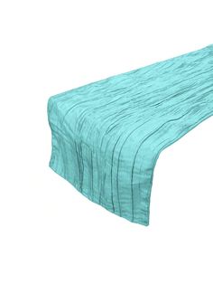 an image of a bed with blue sheets