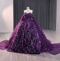 Experience a regal sensation in our exquisite deep purple party ball gown, adorned with luxurious and vibrant multi-colored sequined designs. The stunning sweetheart neckline and fitted bodice add a touch of elegance, while the satin ribbon lace up back allows for a comfortable and customizable fit. Complete with a sweeping train, this gown is sure to make a statement. material: organza color: as shown type: party ball gown built in bra sweetheart neckline off the shoulder long drape train as shown lace up back original photos Purple Fitted Gown For Quinceanera, Fitted Purple Gown For Quinceanera, Purple Ball Gown With Fitted Bodice For Prom, Purple Fitted Quinceanera Dress For Formal Occasions, Fitted Sequin Gown For Quinceanera, Fitted Purple Quinceanera Dress For Prom Season, Fitted Sequin Dress For Quinceanera, Elegant Purple Ball Gown For Gala, Purple Floor-length Quinceanera Dress