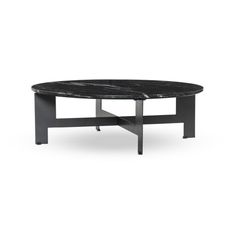 a black marble coffee table with metal legs and an oval shaped base, on a white background