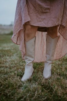 Western-inspired knee high boot with a sophisticated silhouette. Details: Leather upper. Manmade outsole. 15 in / 38.1 cm shaft height. 14 in / 35.56 cm boot opening. 2.5 in / 6.35 cm heel. Textile lining. Padded insole. Pull on style. Ivory color. Fits true to size. Western Knee-high Boots For Spring, White Leather Knee-high Boots Medium Width, White Leather Knee-high Boots With Wide Calf, White Leather Wide Calf Knee-high Boots, White Wide Calf Western Knee-high Boots, White Wide Calf Knee-high Boots For Spring, White Western Knee-high Boots With Wide Calf, White Leather Knee-high Boots With Reinforced Heel, Spring Knee-high Boots With Reinforced Heel