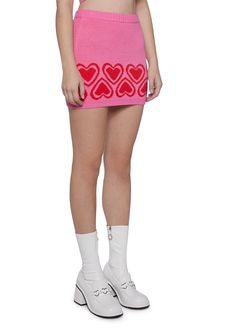 cuz hugs and kisses! This mini skirt has a knit construction, a heart print hem, and an elastic waistband. Trendy Pink Stretch Mini Skirt, Trendy Stretch Pink Mini Skirt, Trendy Pink Mini Skort, Pink Heart Print Bottoms For Spring, Trendy Mini Pink Bottoms, Trendy Pink Mini Bottoms, Pink Fitted Cute Skort, Pink Bottoms For Valentine's Day, Casual Pink Mini Skort