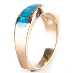 14k Yellow Gold AA Opal Inlay Wave Style Ring 7.2gMetal Information: 14k Yellow GoldTotal Weight: 7.2gBand Width: 3.3mmSize: 9.75Stone InformationMain StoneGem Type: OpalShape: InlayColor: MultiClarity/Quality: AANumber of Stones: 7Estimated Retail Price: $1610.00OUR PRICE: $1285.00SizingMany of our pieces can be re-sized at the buyers request. Please email us if you require our skilled professional services.45911 Formal Rings With Inlay, Fine Jewelry Yellow Gold Opal Ring With Polished Finish, Yellow Gold Opal Ring With Polished Finish, Fine Jewelry With Inlay For Anniversary, Modern Opal Jewelry For Anniversary, Elegant Yellow Gold Jewelry With Inlay, Modern 14k Gold Opal Ring, Formal 14k Gold Opal Ring With Polished Finish, Formal 14k Gold Polished Opal Ring