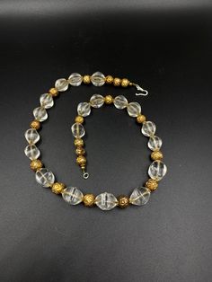 The Beautiful Crystals Quartz Beads Necklace Probably From Ancient Roman's or Greek's From Central Asian Countries Some Gold plated Wax and Some Brass Beads are Used As Spacers The Conditions Of Beads are Very Clearly Shown In the Pictures .Some Beads Got Some Damages that is due to Long Period Of times Price Is Negotiable So Please Do not Hesitate To Make an Offer Fast and Free Shipping Enjoy Beads Gold Beaded Necklace With Gemstone For Costume Jewelry, Gold Costume Jewelry Beaded Necklaces With Gemstones, Gold Crystal Necklace With Large Round Beads, Vintage Gold Beaded Crystal Necklaces, Handmade Ancient Style Necklaces With Round Beads, Vintage Gold Crystal Necklace With Faceted Beads, Antique Polished Gold Beads, Antique Large Gold Beads, Traditional Brown Gemstone Beads