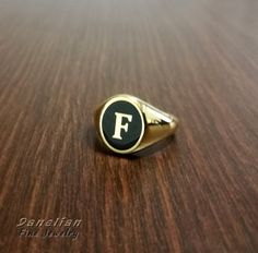 🎁 FREE shipping WORLDWIDE. ✔ Safe shipping of your jewelry order with us. 🌏 EXPRESS delivery upgrade is available at checkout by DHL & FedEx ! Personalized Man Ring ✪ ONE or TWO LETTER - Monogram Ring in Oval Shape ✪ Cushion Signet Ring ✪ Signet Ring Gift Fine ring created in our jewelry workshop with fine jewelry techniques. ☛ Leave us your note with desired letter. Your initial #monogram ring made of sterling silver! #trend2018 18k Gold finish, Rose gold or plain silver made with any #pe Personalized Black Engraved Ring For Anniversary, Black Initial Ring With Polished Finish As Gift, Gift Black Initial Ring With Polished Finish, Black Name Jewelry For Anniversary, Black Round Jewelry With Initials, Black Jewelry With Name For Anniversary, Classic Black Round Initial Ring, Black Engraved Initial Ring For Anniversary, Personalized Black Initial Ring As Gift