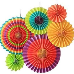 six colorful paper fans hanging from the ceiling