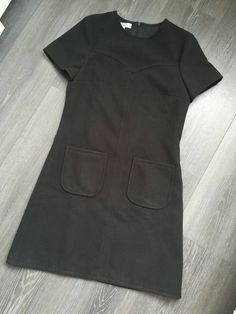 Made under request! Handmade dress in soft wool with lining 90%polyester 2%elastan 8%viscose Color: Black You can see here an example on a coat from the fabric https://www.etsy.com/listing/206734254/mod-wool-coat-60s-retro-soft-light-blue?ref=shop_home_active_1 You can choose your own measurements, length. Special request are easy, just add this listing to your cart https://www.etsy.com/listing/624364219/special-requests?ref=shop_home_active_25 If you want it on a rush you have priority shipping Fitted Knee-length Wool Dress, Fitted Mini Dress For Winter Workwear, Fitted Mid-length Dresses With Pockets, Classic Fitted Dress With Pockets, Black Mod Fit Dresses, Black Fitted Mod Dress, Fitted Black Wool Dress, Black Fitted Wool Dress, Fitted Wool A-line Dresses