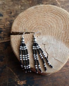 4-Strand Onyx And Navajo Pearl Beads Earring Handmade Southwestern Black Beads, Artisan Black Earrings With Round Beads, Bohemian Black Earrings With Silver Beads, Artisan Black Beaded Dangling Earrings, Southwestern Silver Beaded Earrings, Adjustable Southwestern Black Earrings, Southwestern Black Beaded Dangle Earrings, Black Southwestern Dangle Earrings, Handmade Black Southwestern Beaded Earrings