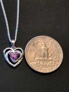 "Sterling Silver Amethyst CZ Heart Necklace Metal: All components are made from solid .925 Sterling Silver Stone: Cubic Zirconia Measurement: pendant is 17mm (0.67\")long including bail and 12mm (0.47\") wide Choose Chain Length Please feel free to Convo me with any questions before purchasing. Please view policy before purchasing You can find other CZ and Birthstone Jewelry in my shop here https://www.etsy.com/shop/LinksAndStones?ref=seller-platform-mcnav&section_id=24399452 Thank You For V Purple Heart Cut Sterling Silver Necklace, Purple Amethyst Heart Necklace, Elegant Heart-shaped Amethyst Necklace, Purple Amethyst Heart Pendant Necklace, Heart-shaped Amethyst Necklace For Gifts, February Birthstone Necklace, Purple Necklace, February Birth Stone, Opal Necklace