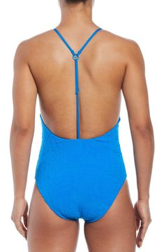 The flattering shape of this one-piece starts with a scoop neckline that gives way to an elongating T-strap design along the open back. T-strap back Full back coverage Lined 93% recycled polyester, 7% spandex Hand wash, line dry Imported Fitted Blue Swimwear With Low Back, Blue Stretch Low-back Swimwear, Blue Beachwear Bodysuit With Moderate Back Coverage, Blue Low Back Bodysuit For Swimming, Blue One-piece Swimwear With Solid Back, Fitted Low Back Blue Swimwear, Blue Swimwear With Scoop Back For Swimming, Beach Bodysuit With Solid Scoop Back, Beach Bodysuit With Scoop And Solid Back