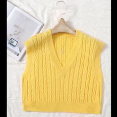 Yellow Cable Knit Sweater Loose Vest. V-Neck Sweater Cardigan Vest. Shoulder-15.5 Armpit 18 Length 18 Casual Yellow V-neck Sweater, Casual Yellow Sweater Vest For Winter, Casual Yellow V-neck Vest, Yellow Knitted V-neck Top, Spring V-neck Sweater Vest, Trendy V-neck Cable Knit Sweater Vest, Yellow V-neck Vest For Spring, Knitted V-neck Sweater Vest For Spring, Knitted V-neck Vest For Spring